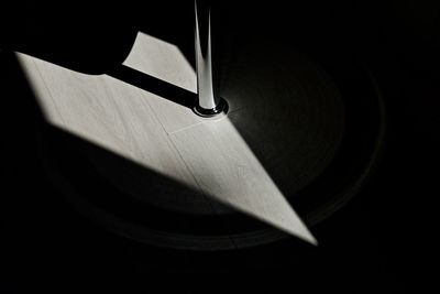 Sunlight falling on hardwood floor in darkroom