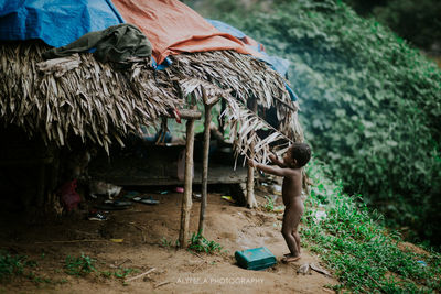 Low section of man working on land