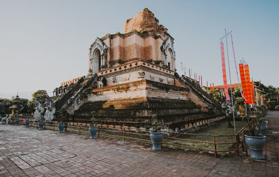 Exterior of temple against clear sky in city