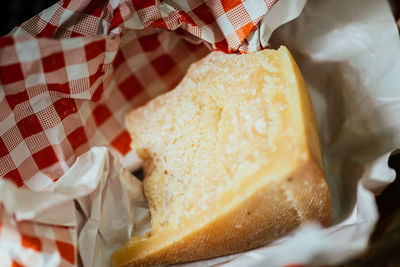 Close-up of cheese on paper