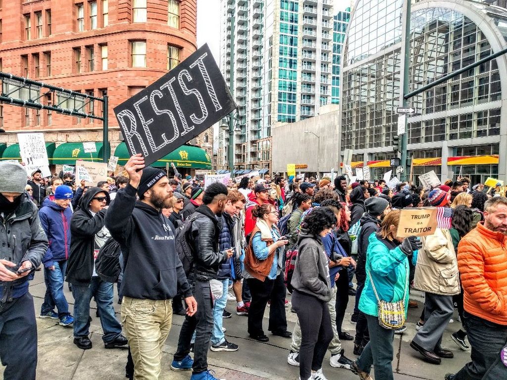 CROWD WALKING IN CITY