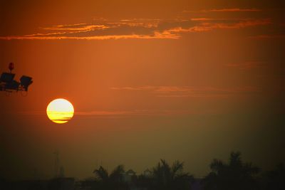 Scenic view of silhouette landscape against sky during sunset