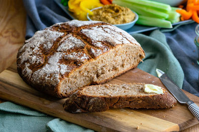 Close-up of chopped bread on cutting board