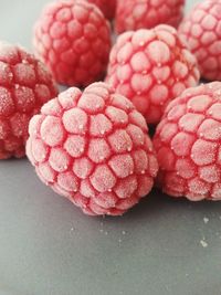 Close-up of frozen raspberries