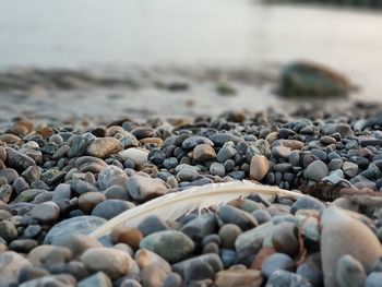 Close-up of stones on beach