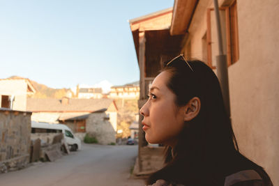 Side view of woman looking away