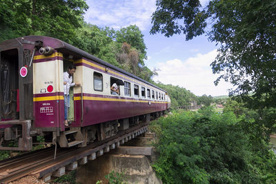 Train on railroad track against sky