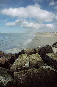 Scenic view of beach against sky