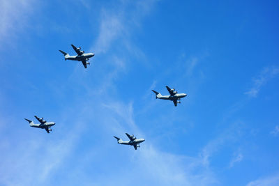 Low angle view of airplane flying in sky