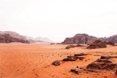 Scenic view of desert against clear sky