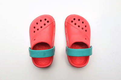 Colorful children's rubber sandals isolated on the white background.children's fashion slippers