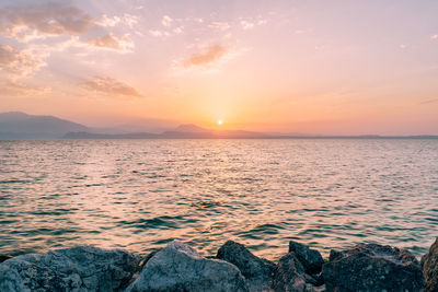 Scenic view of sea against sky during sunset