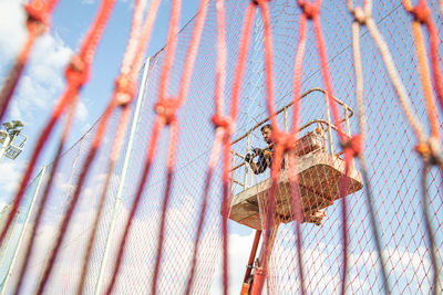 Low angle view of metallic structure against sky