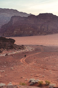 Scenic view of landscape and mountains against sky