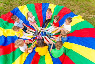 High angle view of people with multi colored umbrella