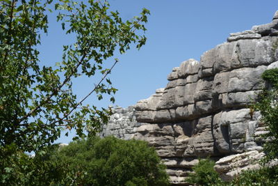 Low angle view of rocks against clear sky at el torcal nature reserve in andalusia, spain.