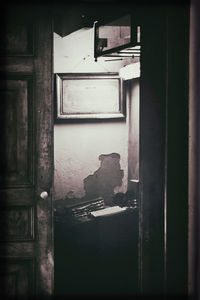 Close-up of window of abandoned building