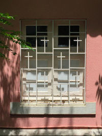 Reflection of building on glass window