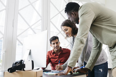 Business people working together in international office