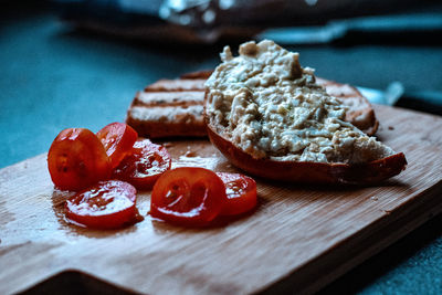 Close-up of bread on cutting board