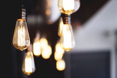 Close-up of illuminated light bulb