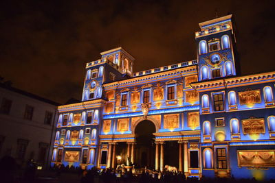 Low angle view of illuminated building at night