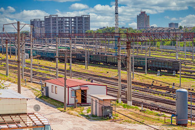 Train on railroad track against sky