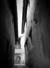 Narrow alley amidst buildings