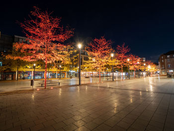 Illuminated street at night