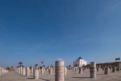 Panoramic view of historical building against blue sky