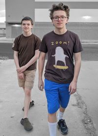 Portrait of a teenage boy standing outdoors