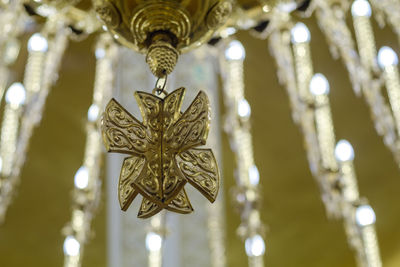 Low angle view of illuminated decoration hanging on ceiling