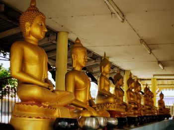 Statues on building outside temple