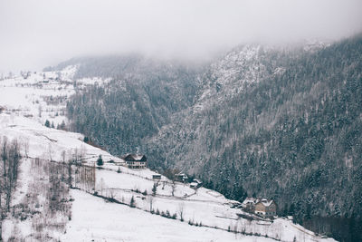 High angle view of snow covered landscape against sky