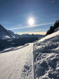 Scenic view of mountains against sky during winter