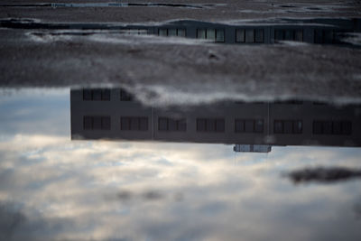 Close-up of building against sky during winter