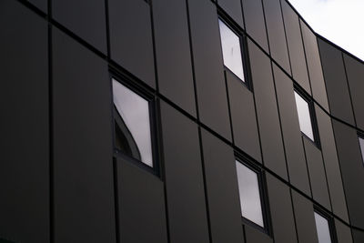 Low angle view of modern building against sky