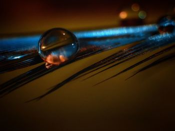 Close-up of water drops on glass