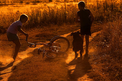 Children playing on dirt road