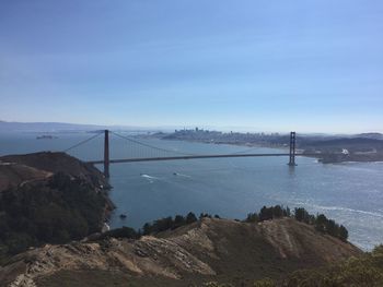 High angle view of golden gate bridge over bay against sky