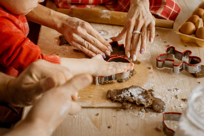 Midsection of man preparing food