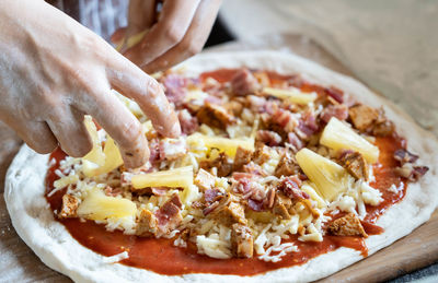 Close-up of hand holding meat