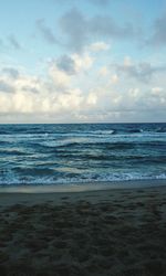 Scenic view of beach against sky