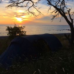 Scenic view of sea at sunset