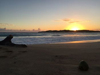 Scenic view of sea at sunset