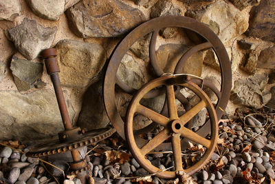 High angle view of old rusty wheel