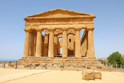 Old ruins of temple against clear sky