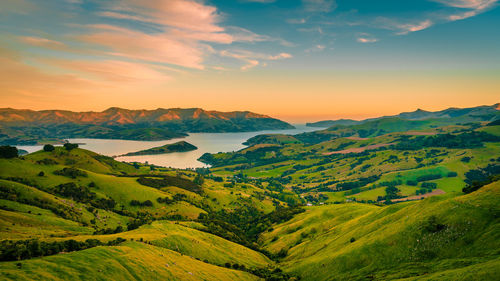 Scenic view of landscape against sky during sunset