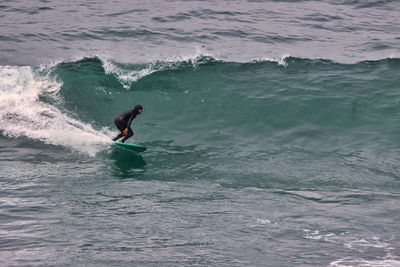 Man surfing in sea