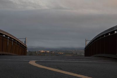 Road in city against sky